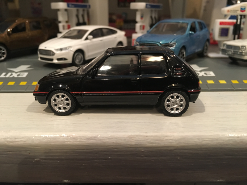 Illustration for article titled French Friday Norev Peugeot 205GTI 1:64 scale